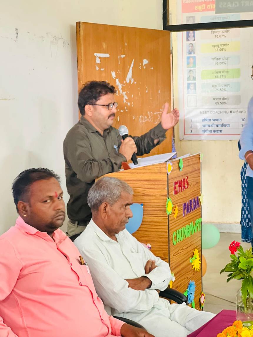 A speaker at the EMRS Parda Chundawat podium during a school programme